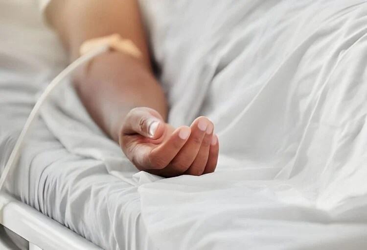 hand of a woman receiving plasma