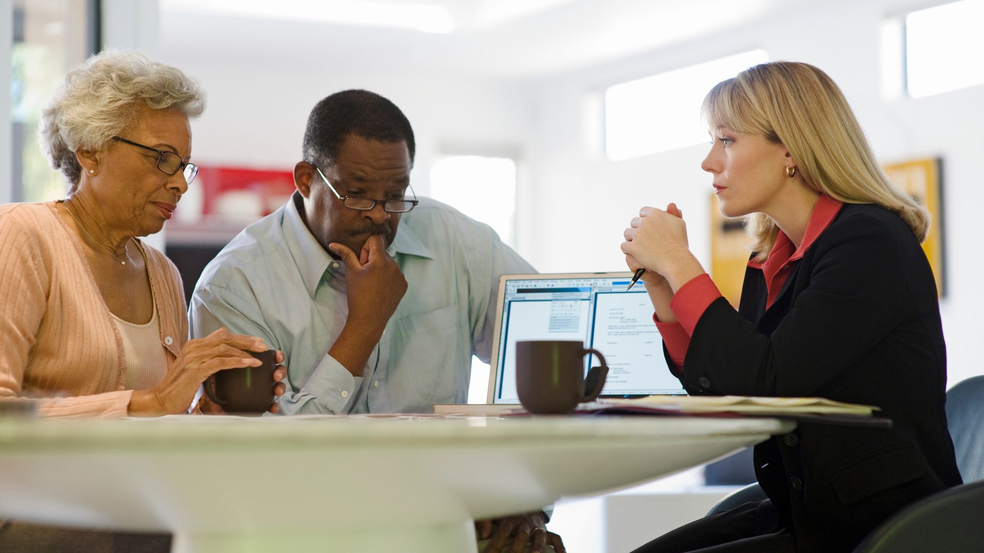 A couple meets with a licensed agent to review their Medicare options.