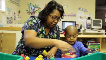 Jennifer Calvert, director of the ABC Pre-School & Nursery Inc. in Aberdeen, Miss., helps a student build a pattern during a morning activity earlier this year. Educators say early education is critical to fix Mississippi’s education deficiencies. (Photo: Jackie Mader)