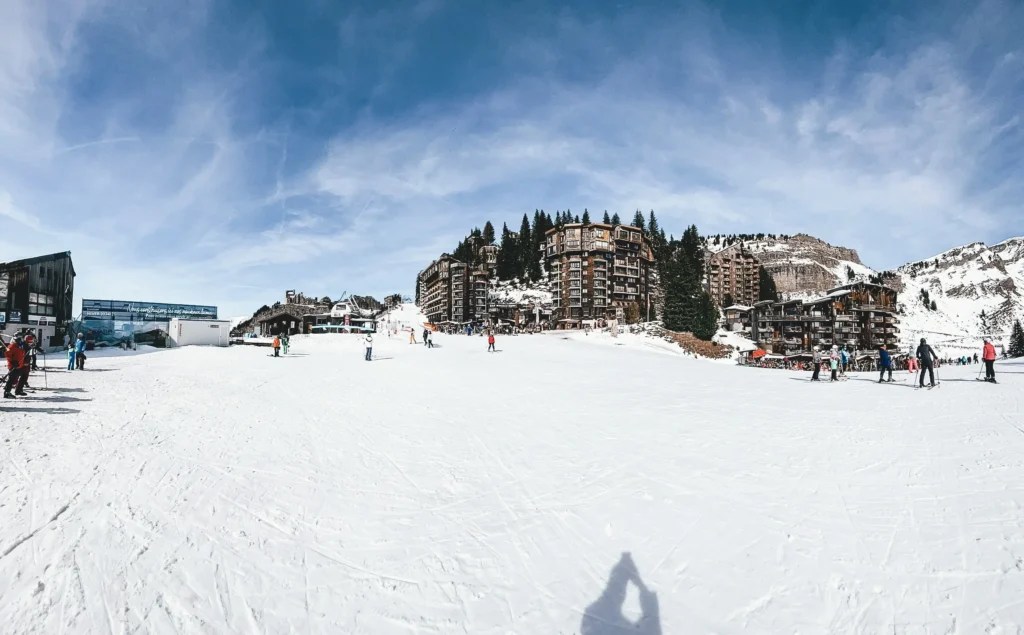 A wide angle view of Avoriaz. No roads, just cat tracks and wooden chalets.