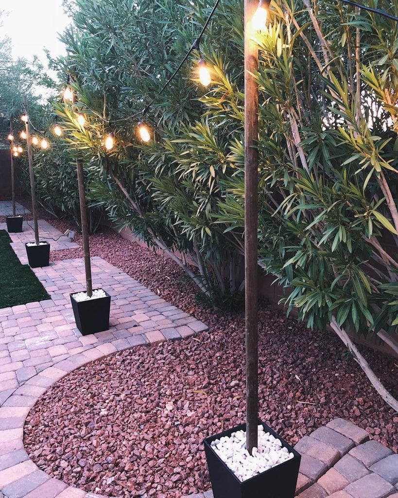 How to hang backyard string lights without trees (or proper diy string