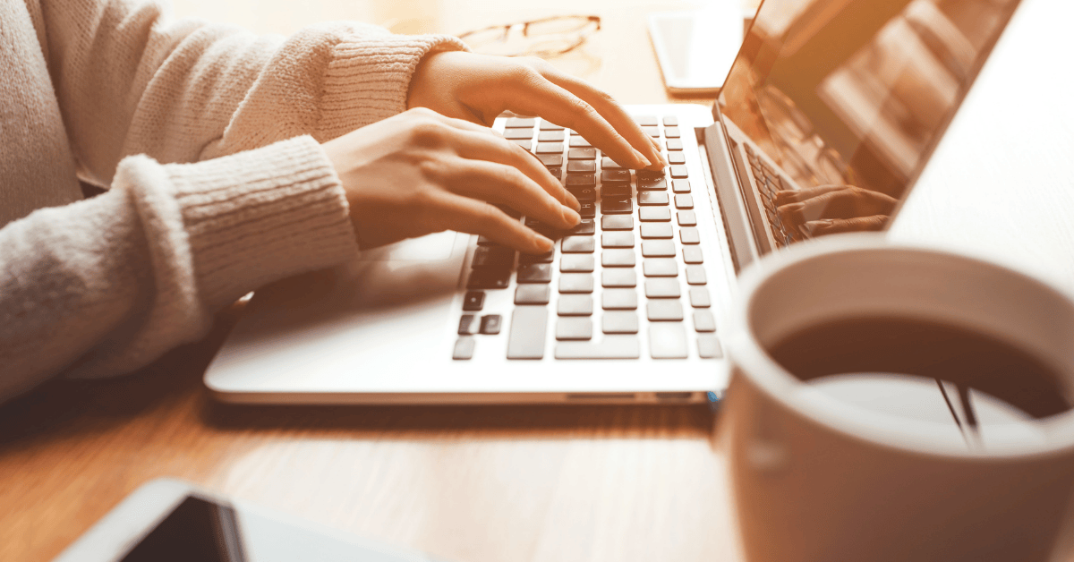 woman typing on laptop discovering her to-do list is lying to her
