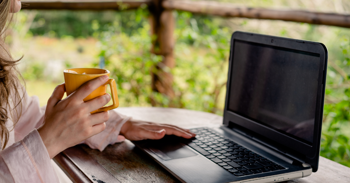 woman with coffee and laptop starting over every Monday morning
