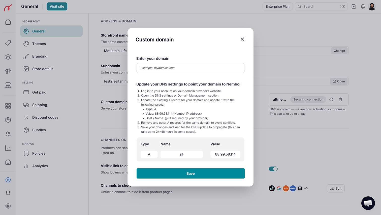 The Custom domain dialog in Nembol Storefront, showing the DNS A record values