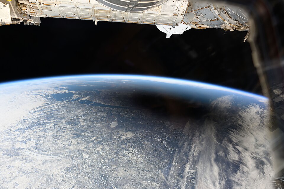 The Moon’s broad shadow crossing Earth beneath the International Space Station during the April 8, 2024 total solar eclipse