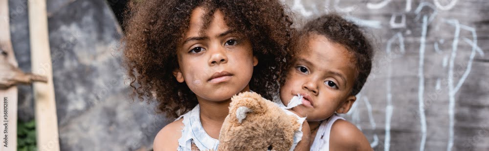 Poor impoverished hungry young brother and sister