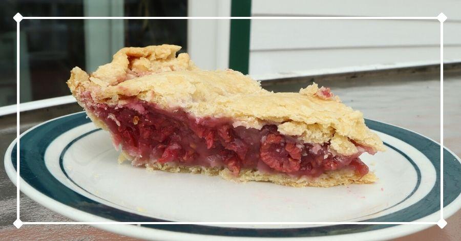 Baked slice of completed raspberry pie recipe
