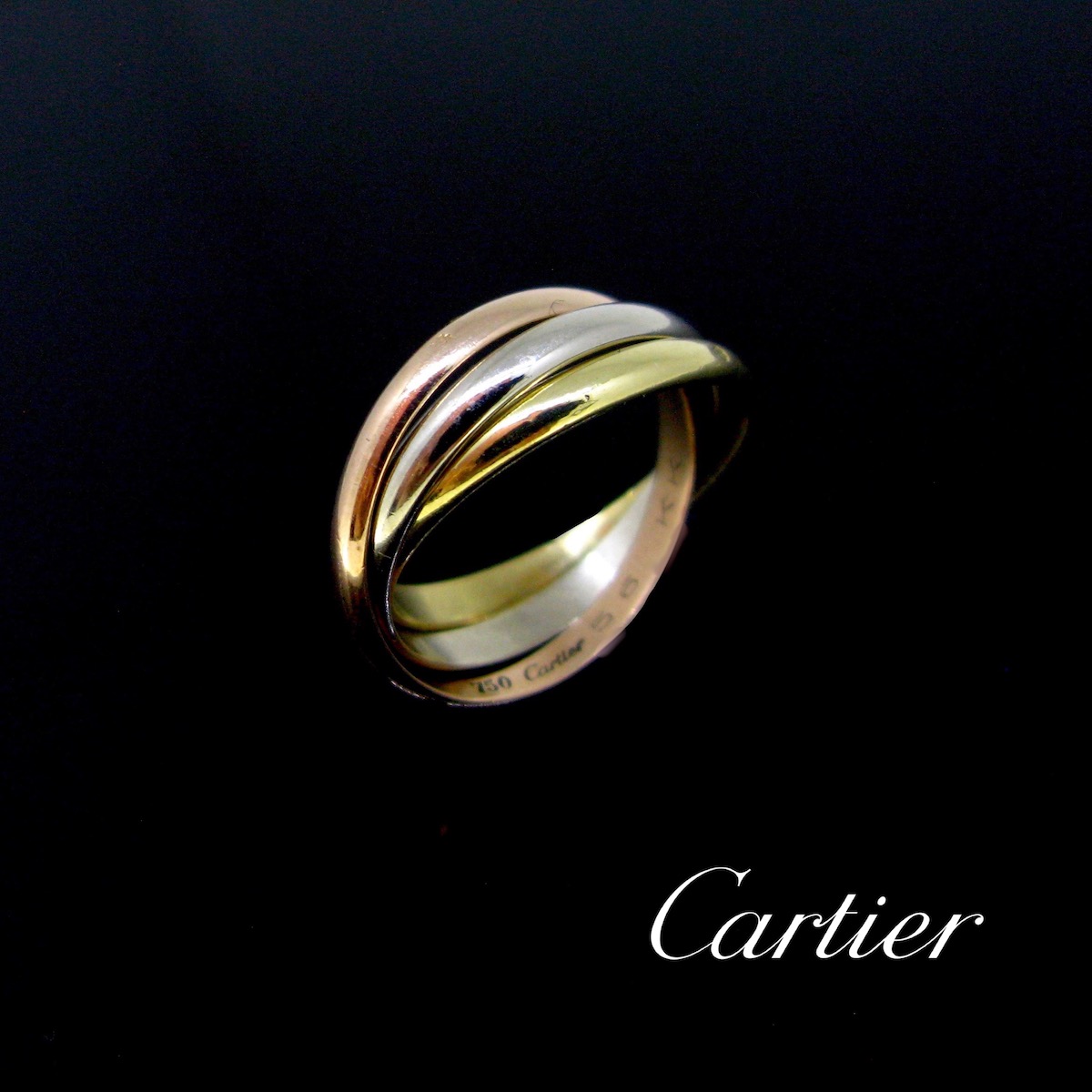 Three gold trinity ring by cartier