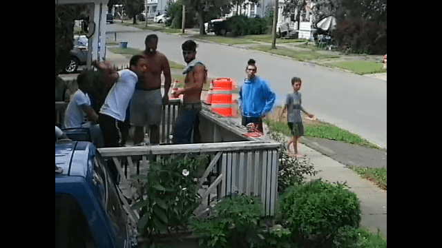 Some of Stanley Sykes lads on porch of 328 Pleasant Avenue.