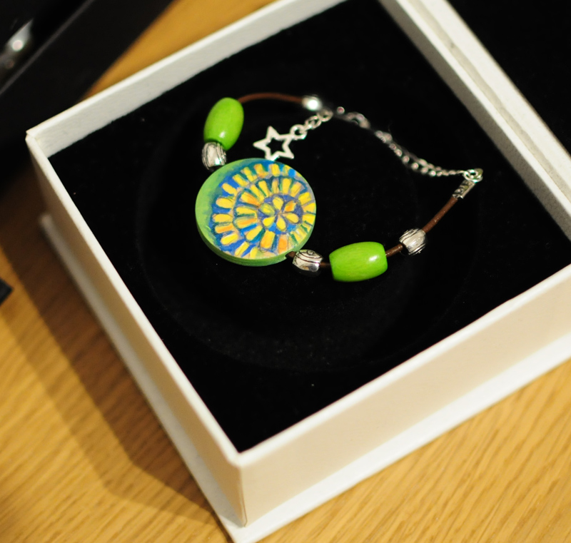 hand painted bracelet on wood