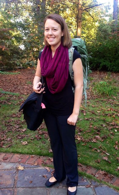 Caroline packing light with a carry-on bag.