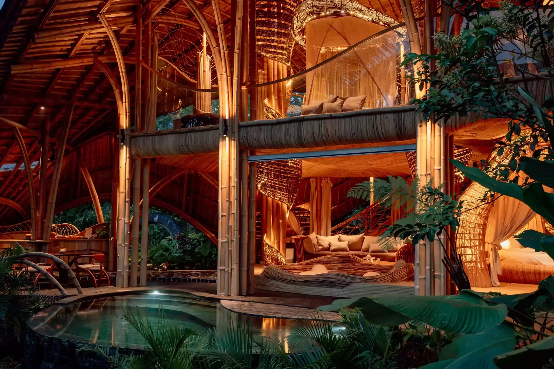 the heated infinity pool at hideout flow with jungle beyond (group-scale)
