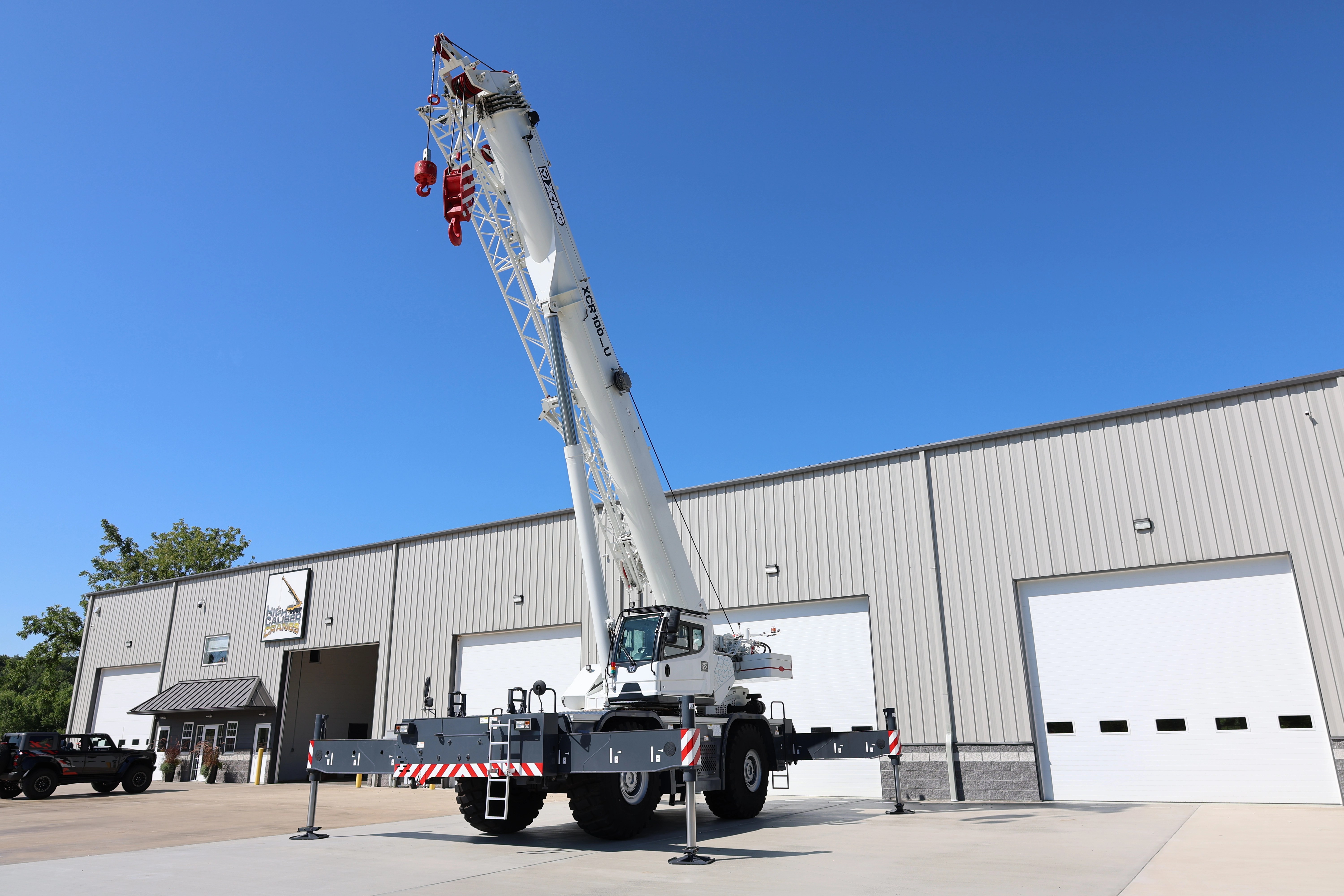 Front driver side view of an XCMG XCR100 rough-terrain crane