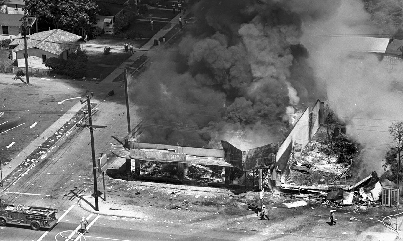 Aug. 13, 1965: Building burns at 107th St. and Avalon Blvd. during Watts Riots. This photo was published in the Aug. 14, 1965 Los Angeles Times.