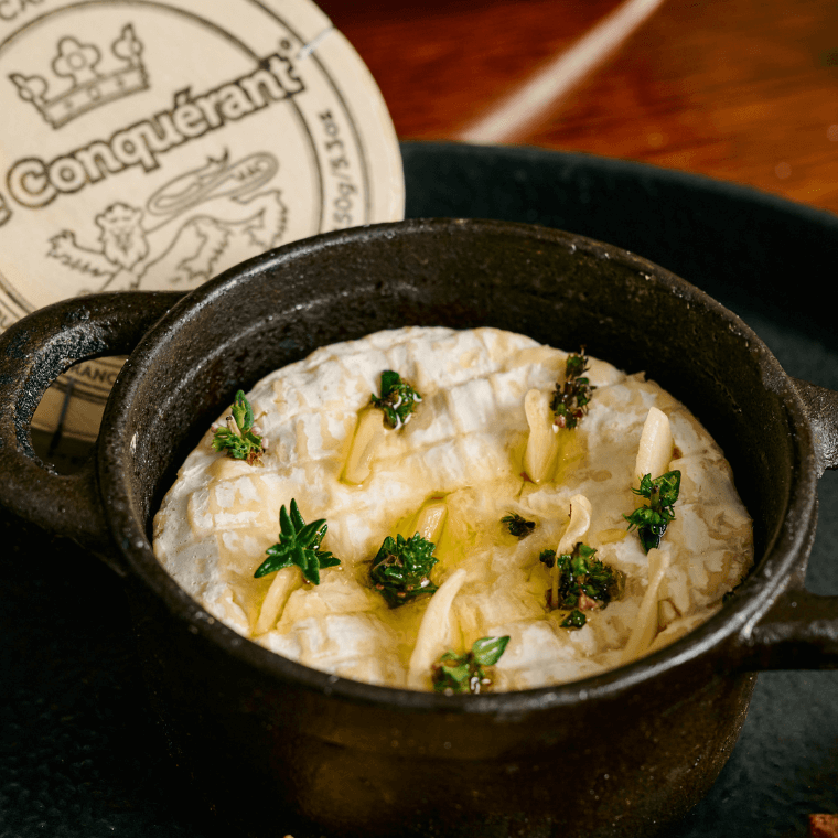 Le Conquerant baked Camembert