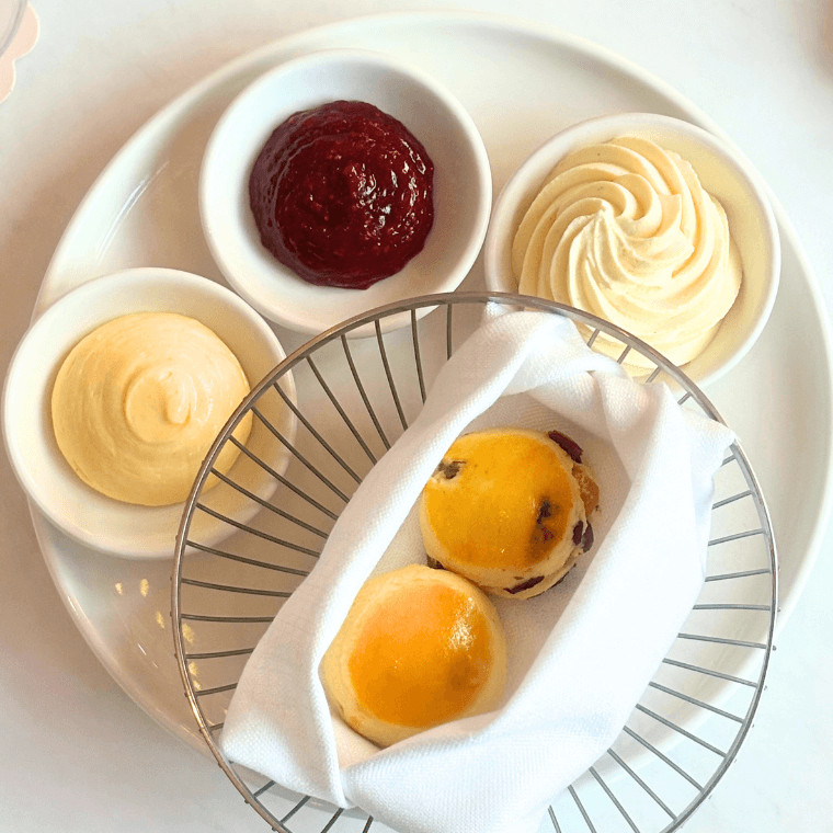 Served with white ‘velvet’ cream, lemon curd, raspberry preserves