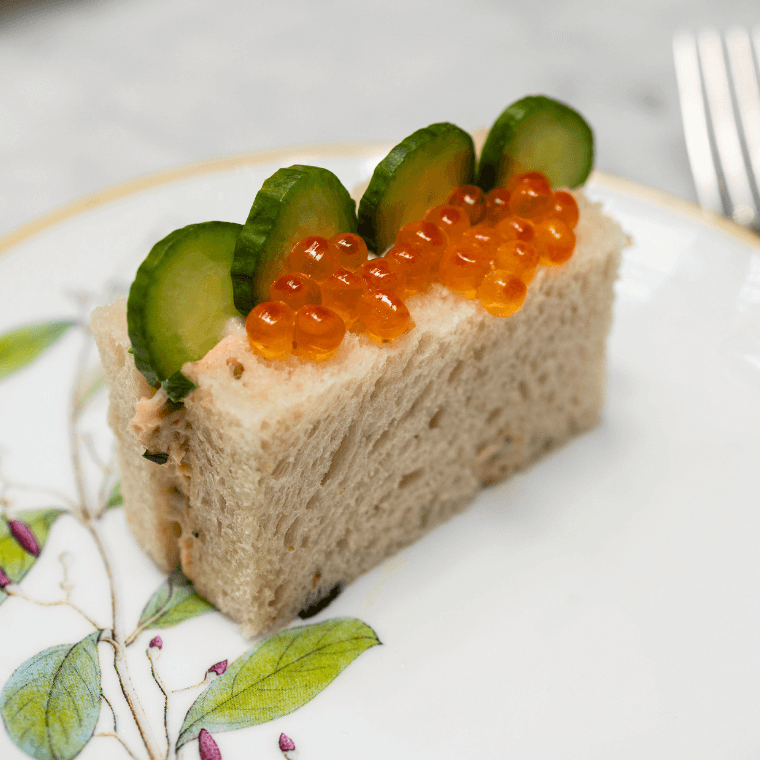 Smoked trout finger sandwich, salmon roe, baby cucumber