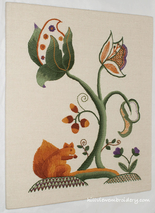 A piece of crewelwork embroidery mounted in the traditional way by Catherine of Hillview Embroidery, trained at the RSN