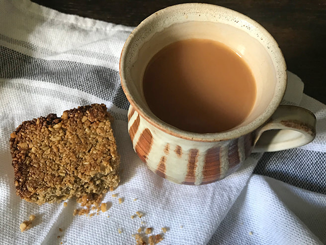 Malted flapjack with mug of tea