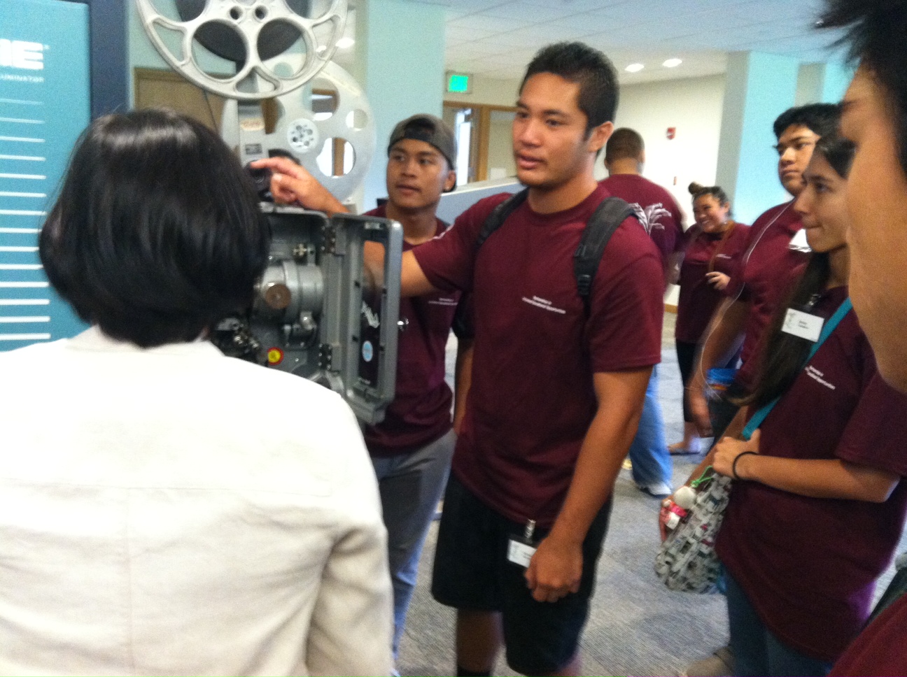 Janel sharing about the projectors w/ the Pueo Program