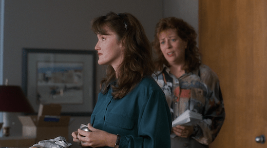 Lauren is upset; her coworker tries to comfort her.