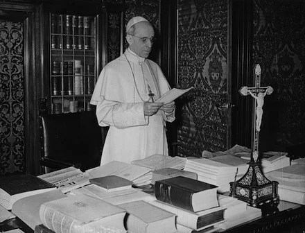 Pope Pius XII, who proclaimed the dogma of the Assumption of Mary in 1950, is seen at the Vatican in 1956. A report presented to the (Anglican) Church of Ireland's general synod claimed there is no biblical or historical basis for the Catholic doctrines of the Assumption and the Immaculate Conception. (CNS photo) (May 15, 2006) See IRELAND-MARIAN May 12, 2006.