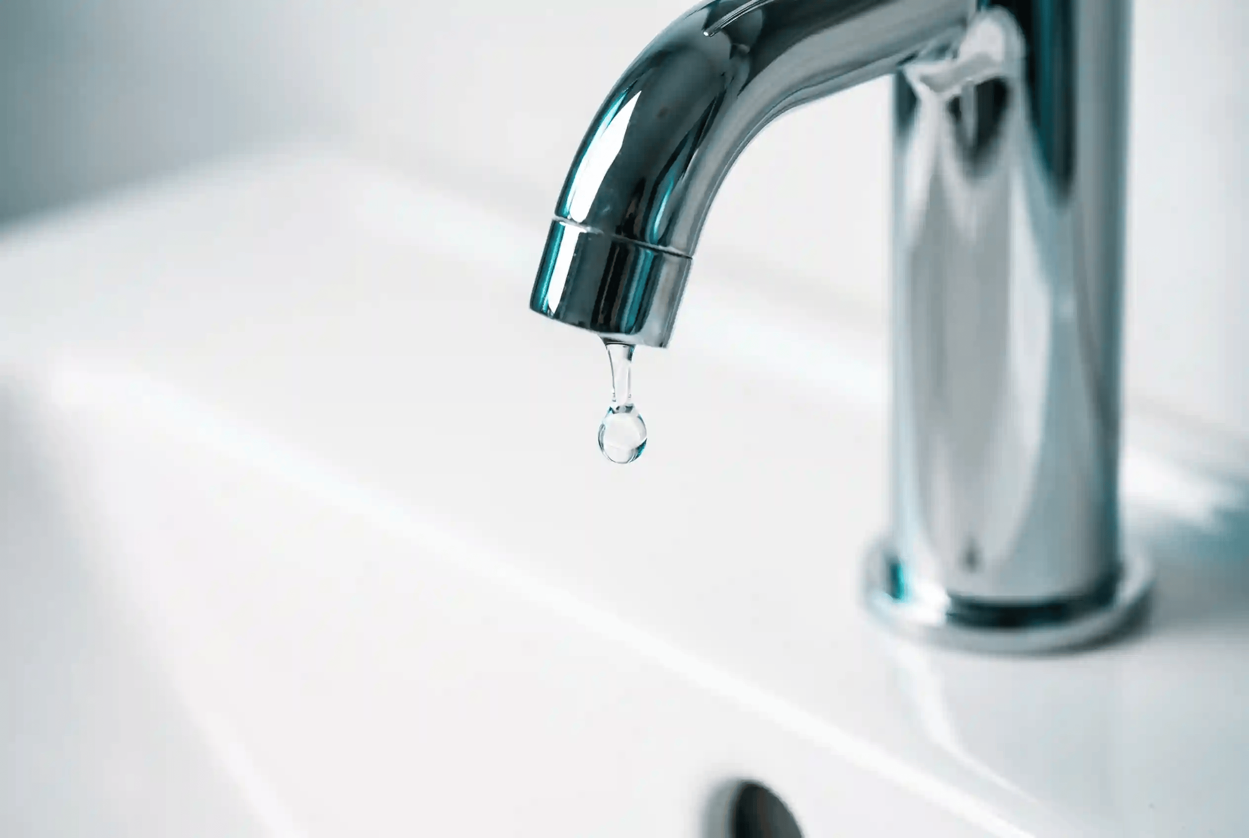 Plumber performing a diagnostic inspection of a home's plumbing system