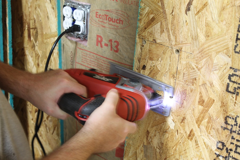How To - Sheathing Garage Walls With Plywood and Insulate Them Too