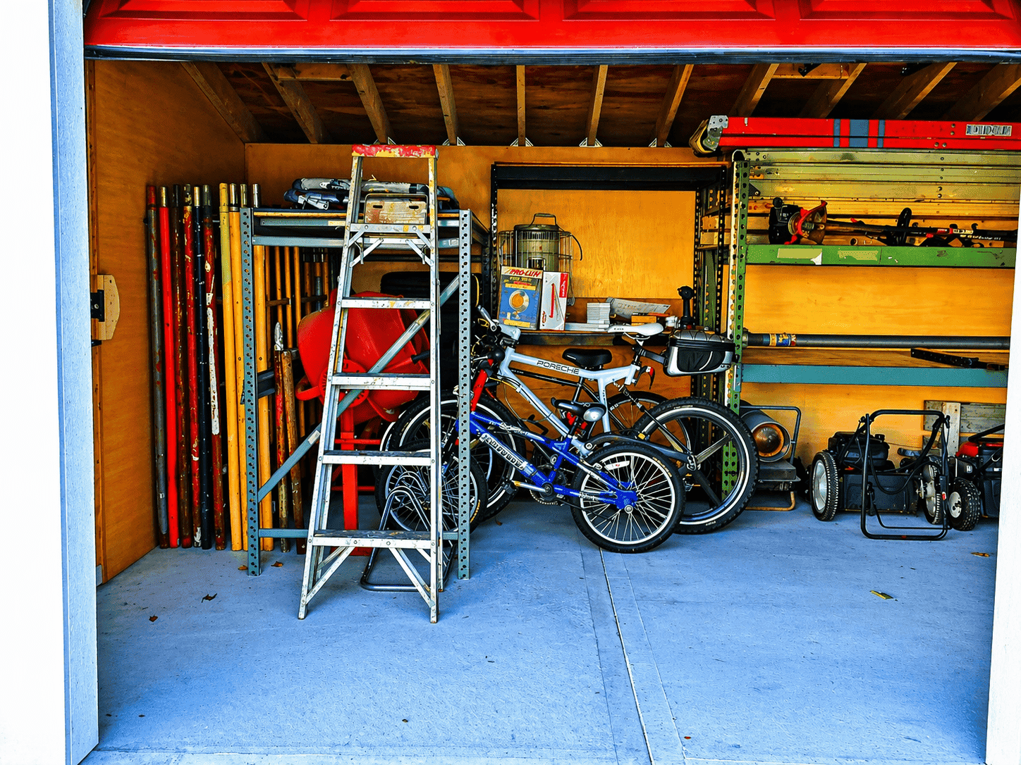 Inside the shed today with bicycles ladder and storage racks