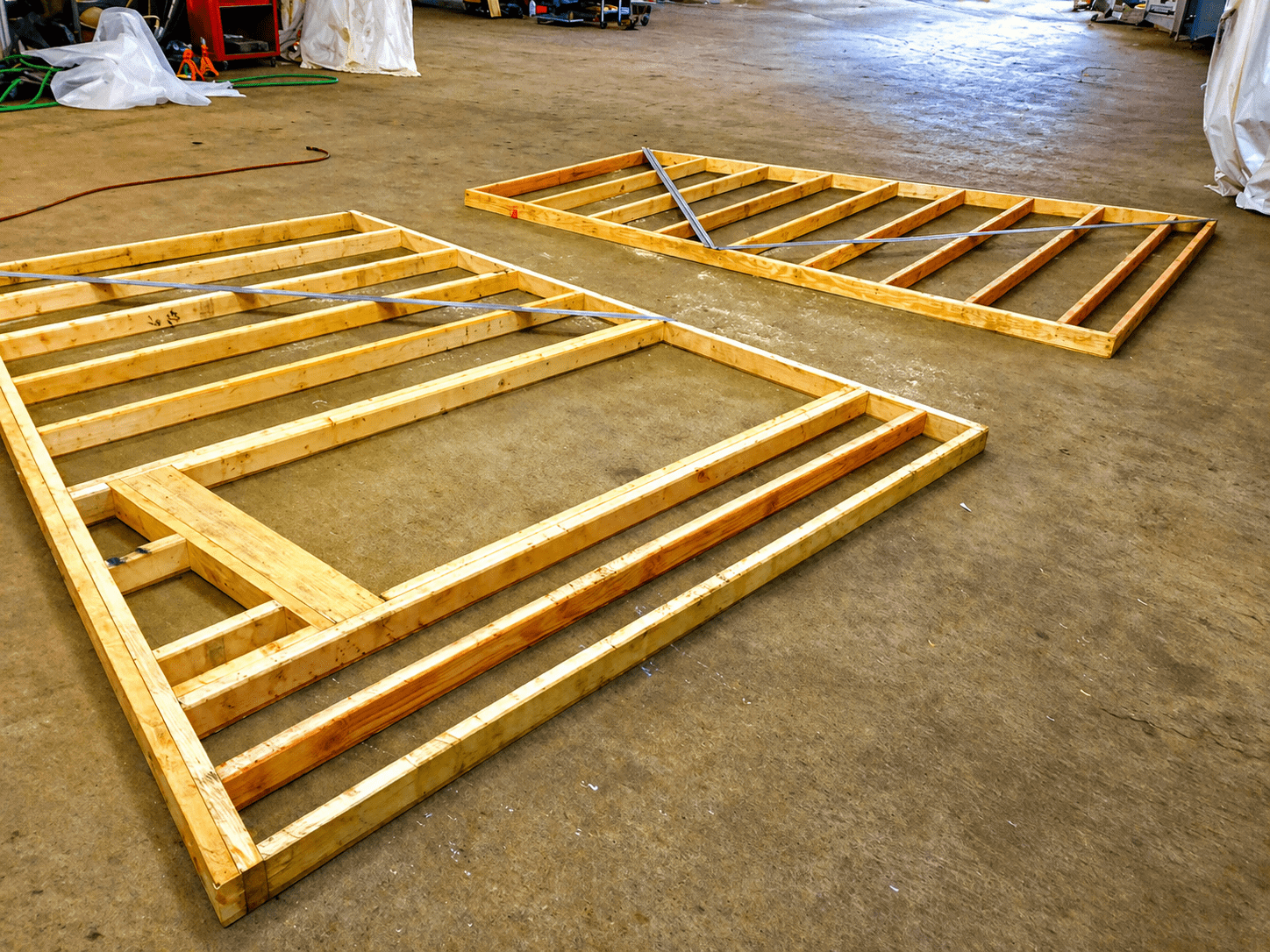Wall frames laid out with diagonal steel strap bracing