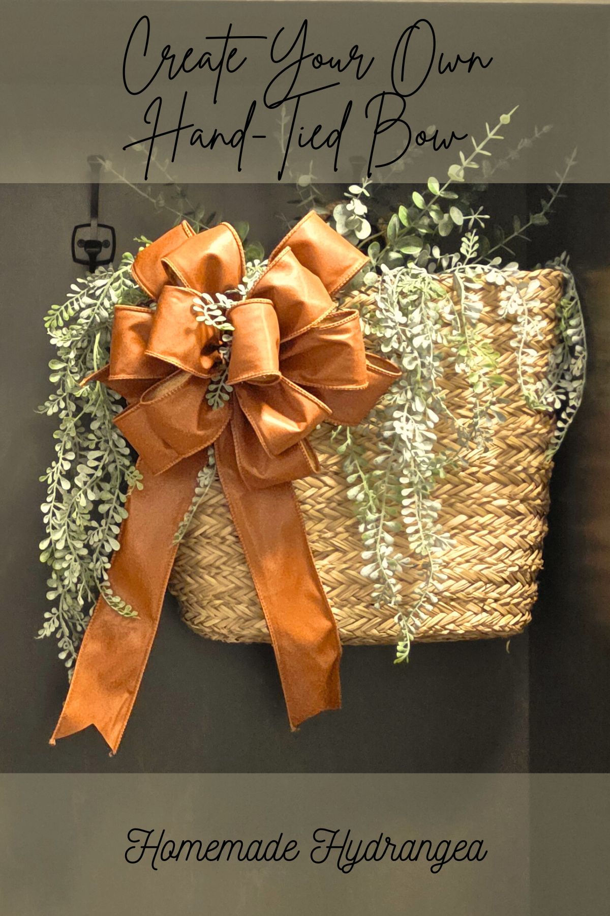 DIY Standard Bow Pin Image. Brown leather-like ribbon hand tied into a 5 yard standard bow. Bow is hanging on a woven basket with hanging greenery.