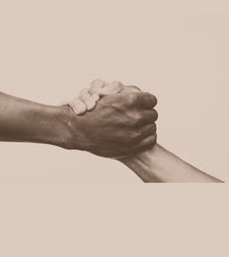 Two hands clasped together