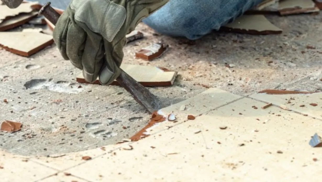 How to remove tile from concrete floor