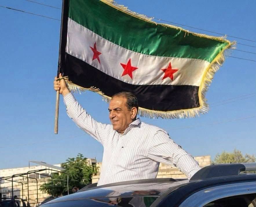 مصعب أبو ركبة خلال ظهوره في مدينة نوى بريف درعا عقب عودته إلى سوريا من النمسا. مواقع التواصل الاجتماعي.