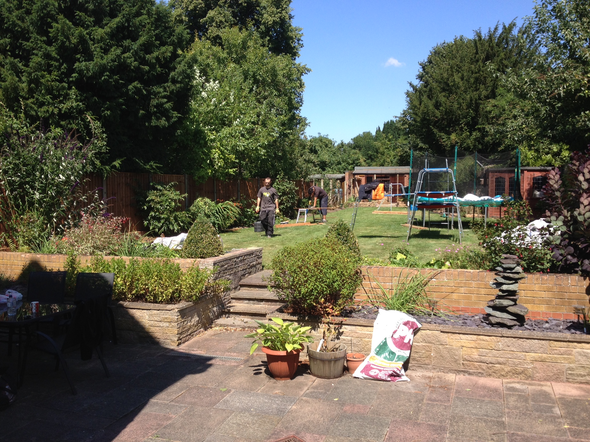 Before hard landscaping and new planting