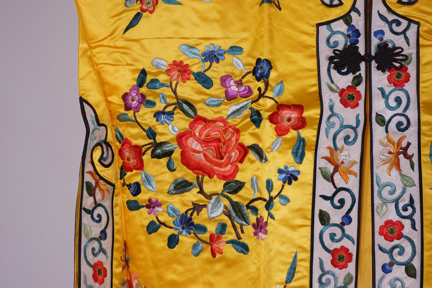 C. 1912-1949 民国 明黄地刺绣四季花卉图锦衣