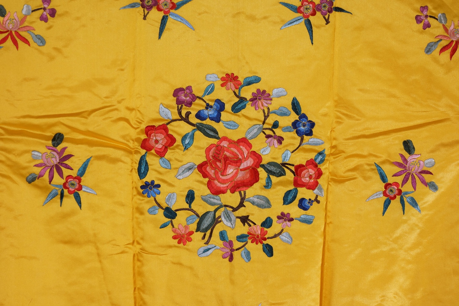 C. 1912-1949 民国 明黄地刺绣四季花卉图锦衣