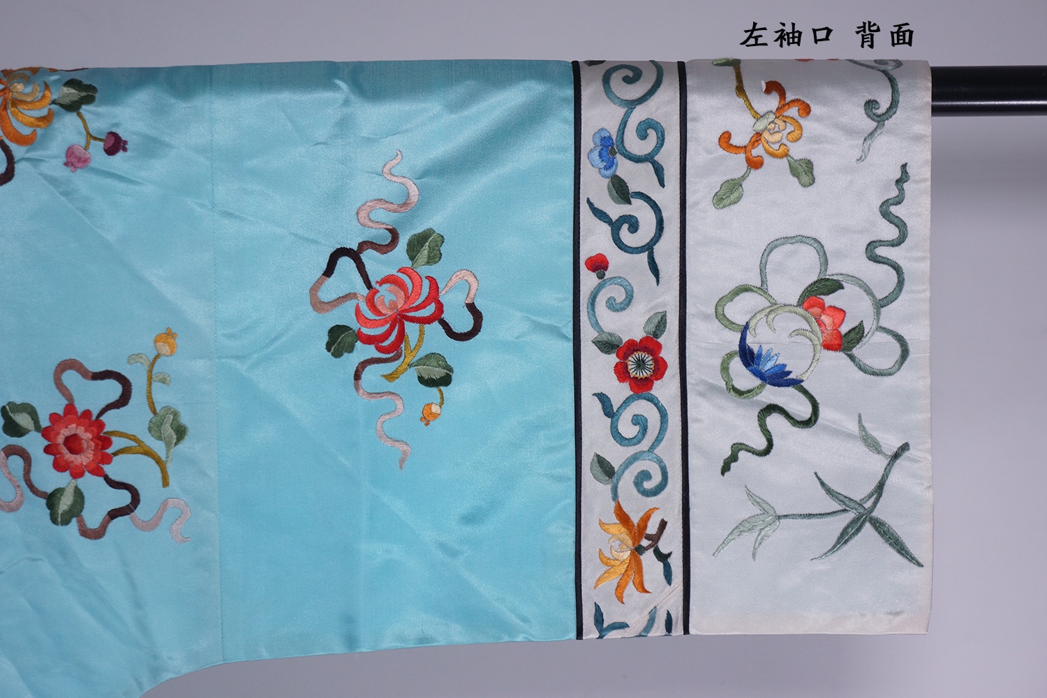 C. 1912-1949 民国 天蓝地刺绣四季花卉图锦衣