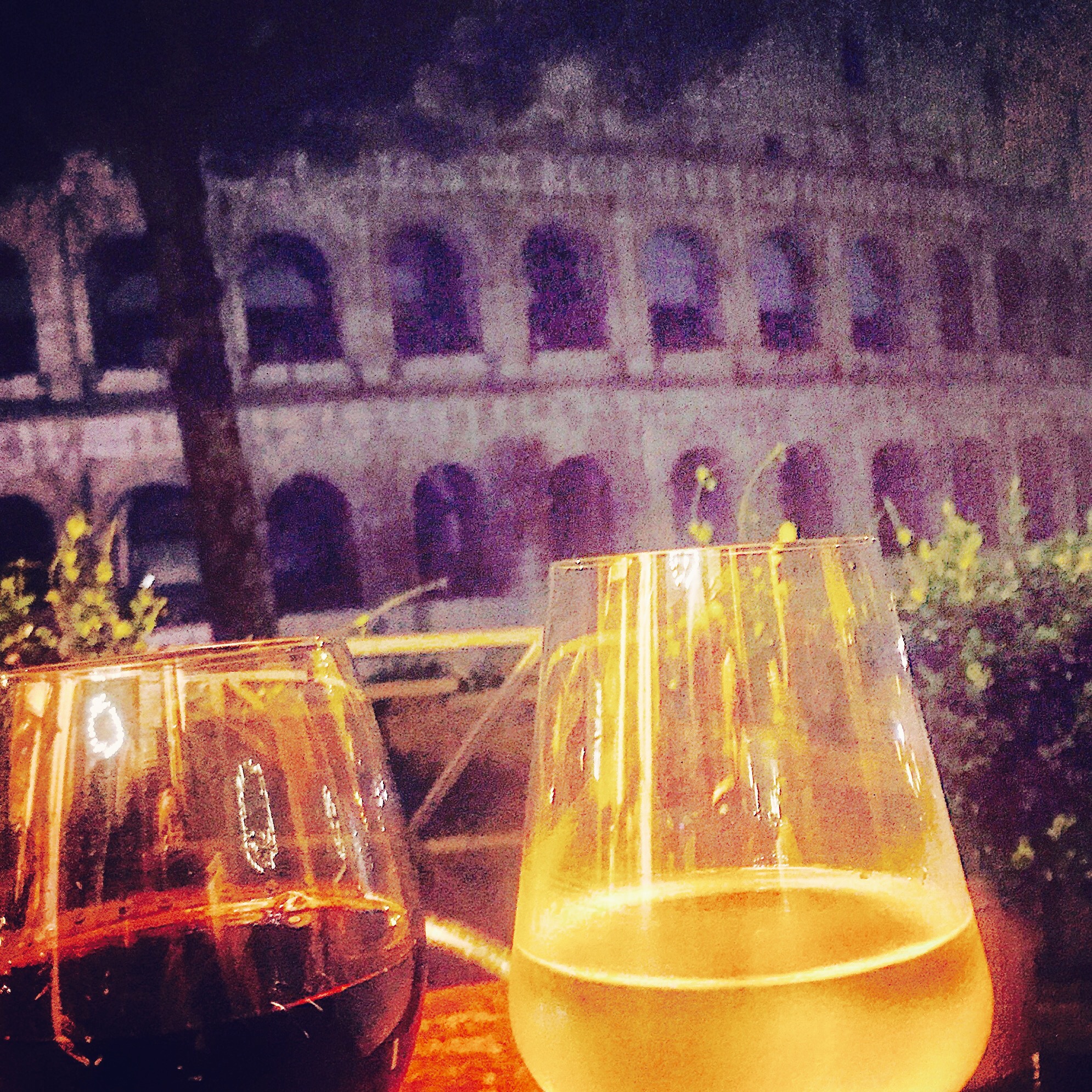 It's pouring with rain in Rome but the upside is you can get a front row seat at the Coloseum while you drink your wine!