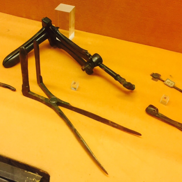 It's spooky how much the ancient forceps and speculum look like the modern ones.