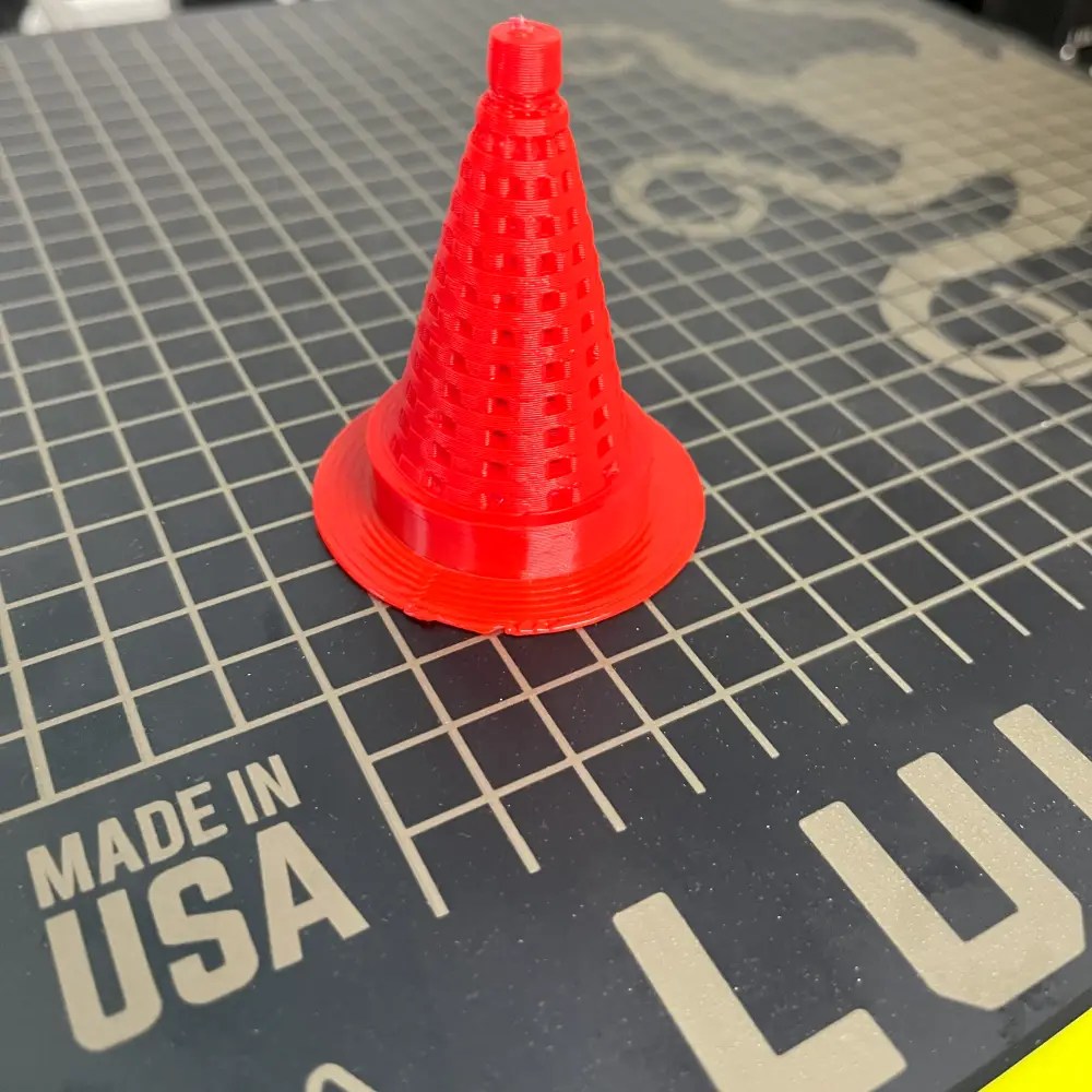 3D printed vacuum mold tool with skirt printed on LulzBot TAZ Pro using red PLA filament