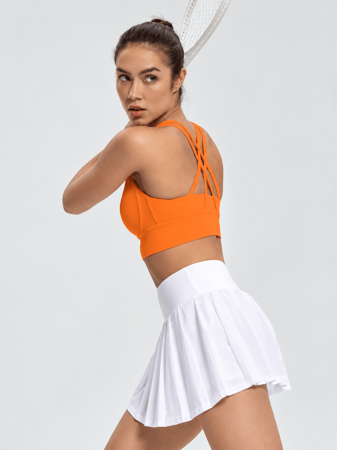Integrated fixed-cup sports vest