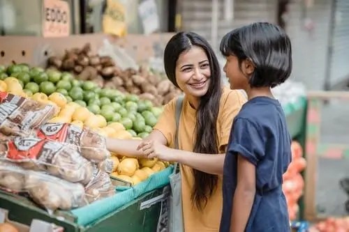 Woman and son shopping for produce. Seborrheic Dermatitis. Gut Health