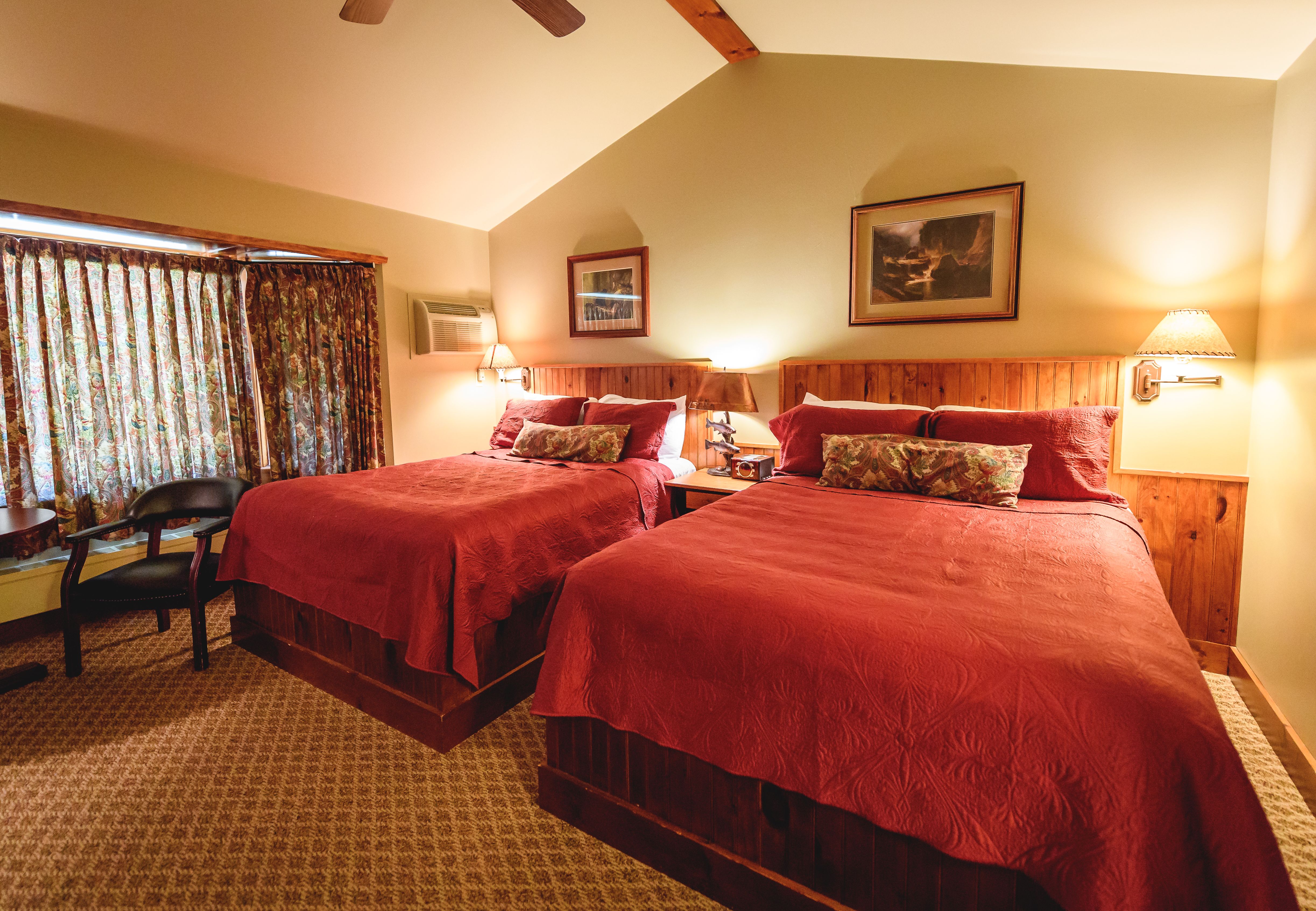 lake placid lodging photo of deluxe queen room at Hungry Trout