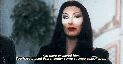 Image result for morticia laugh gif