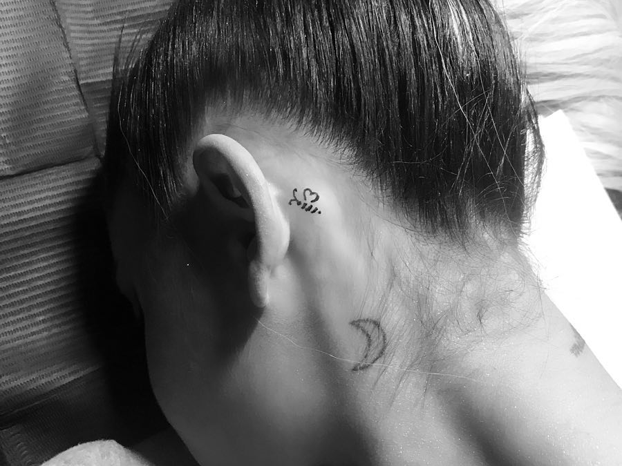 It's appealing with the cat sitting on the luna gazing down on the world. A Complete Guide To Ariana Grande S 55 Known Tattoos