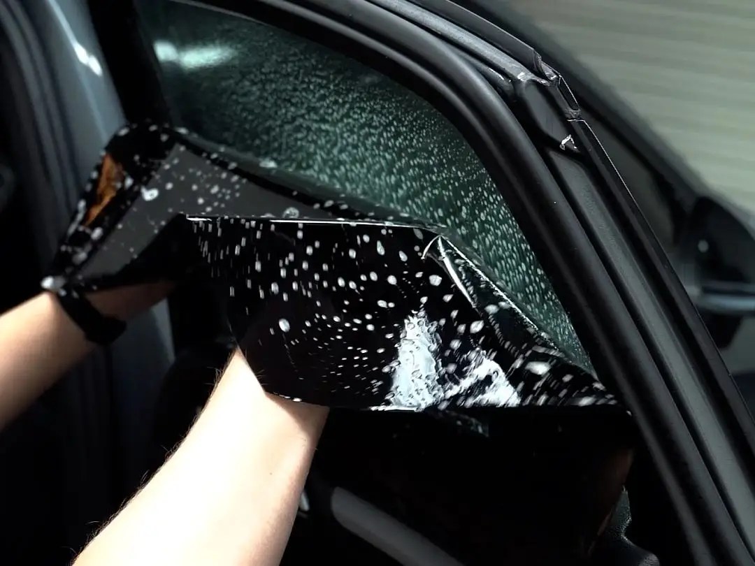 watch how a professional perfectly installs car window tints on how to tint car windows at home