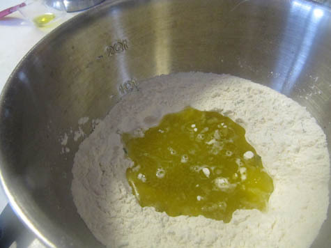 Rustic bakery organic sourdough flatbread bites made with olive oil and natural sel gris (grey sea salt) from france. Marinated Eggplant and Zucchini with Capers and Mint