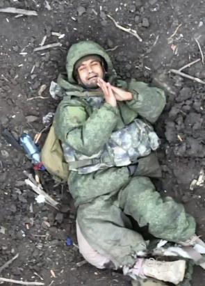 Indian army soldier recruited by Russian Army begging in front of a Ukrainian FPV drone.