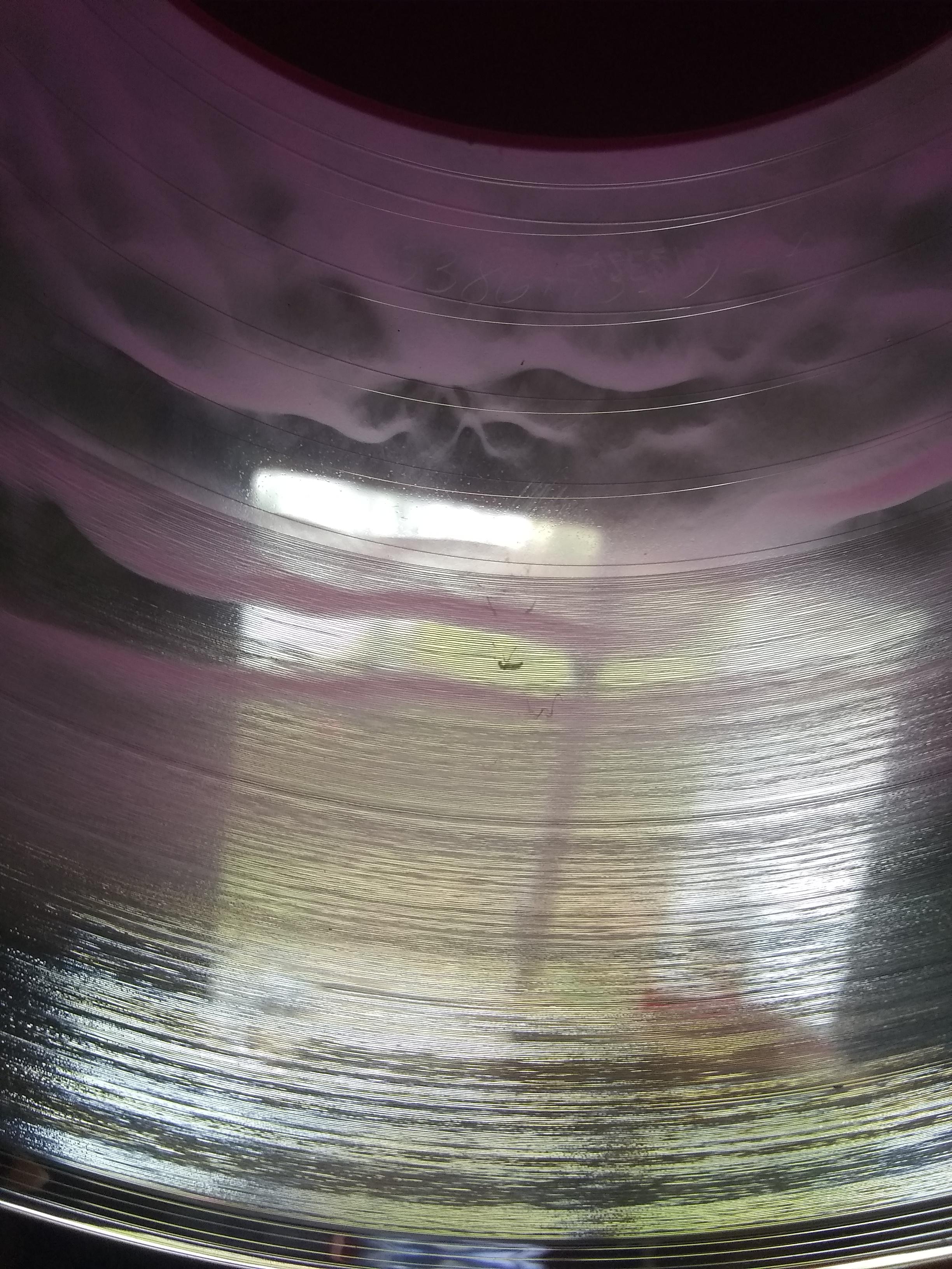 turns out a bug got stuck in the vinyl print press and now i have a